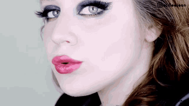 a close up of a woman 's face with a watermark on the bottom right corner that says @kailee leon