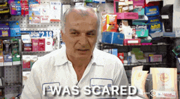 a man in a white shirt says i was scared in a store
