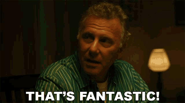 a man says that 's fantastic in a dark room