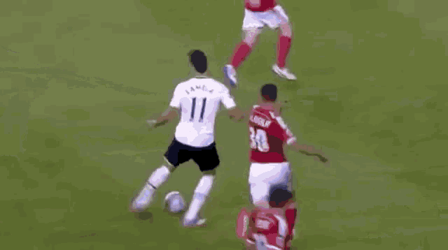 a soccer player in a red jersey with the number 16 on it