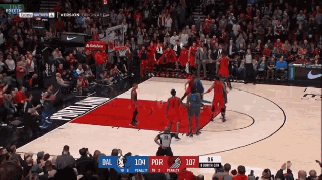 a basketball game is being played in portland and the score is 104 to 107