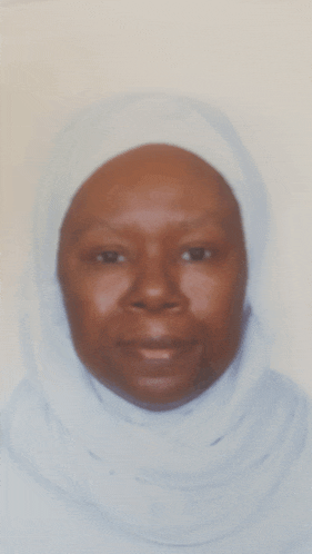 a woman wearing a white scarf around her head
