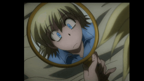a person looking at their reflection in a mirror with their eyes closed