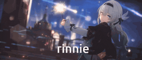 a girl holding a sparkler with the name rinnie on the bottom right