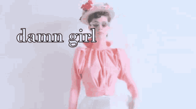 a woman in a pink dress is holding a fan with the words damn girl written above her