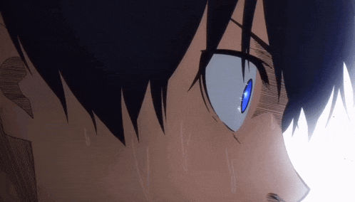a close up of a person 's eye with blue eyes