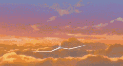 a plane flying in the sky with the words the wind rises