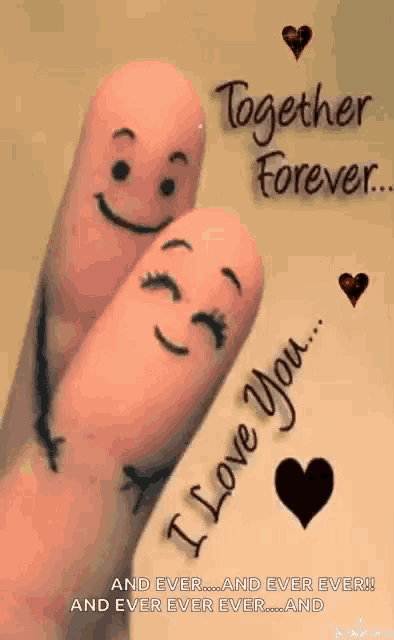 a couple of fingers with faces drawn on them and the words `` i love you '' .