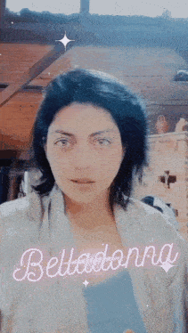 a woman with the word belladonna on her face