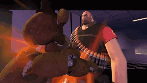 a man in a red shirt is standing next to a brown bear