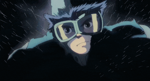 a close up of a person wearing glasses and a helmet