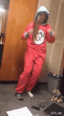 a person in a dr. seuss costume is dancing