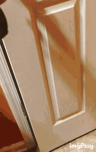 a close up of a door with the words imgplay written below it