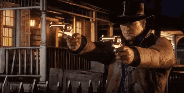 a man in a cowboy hat is holding two guns in front of a house .
