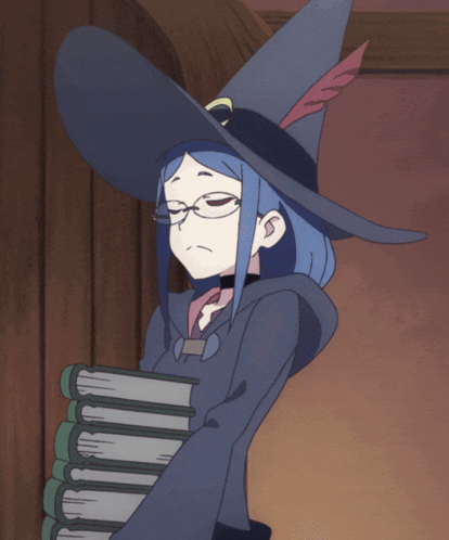 a witch wearing glasses and a hat with a c on it
