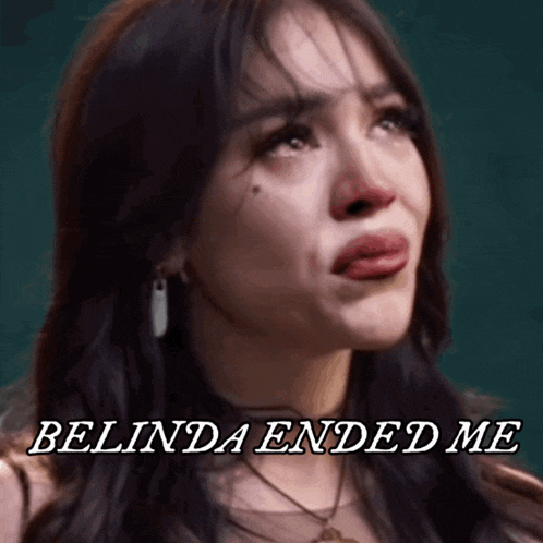 a woman is crying with the words belinda ended me written below her