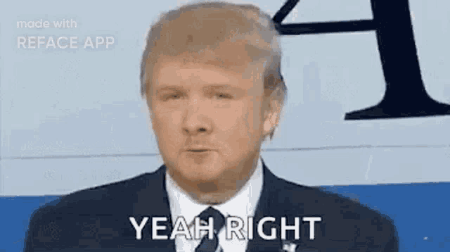 a man in a suit and tie is saying yeah right .