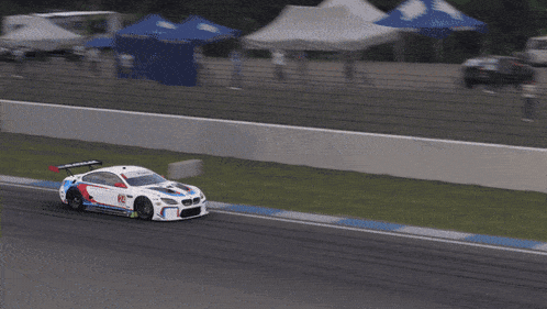 a race car has the number 24 on the side