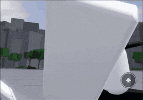 a white object with an arrow pointing up in front of it