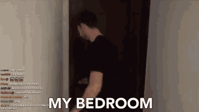 a man in a black shirt is standing in a doorway with the words " my bedroom " written on the bottom
