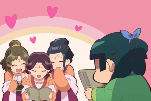 a girl in a green shirt is reading a book to two girls