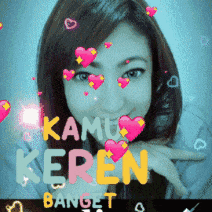 a girl with hearts in her eyes and the words kamu keren