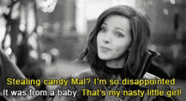 a black and white photo of a woman with a caption that says " stealing candy mal "
