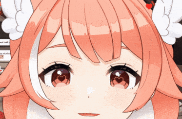 a close up of a cartoon character 's face with a heart shaped eye