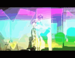 a pixelated image of a person standing in front of a colorful background