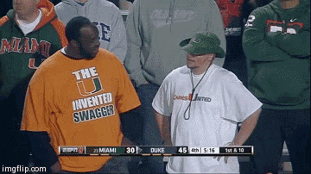 a man wearing an orange shirt that says " the invented swagger "