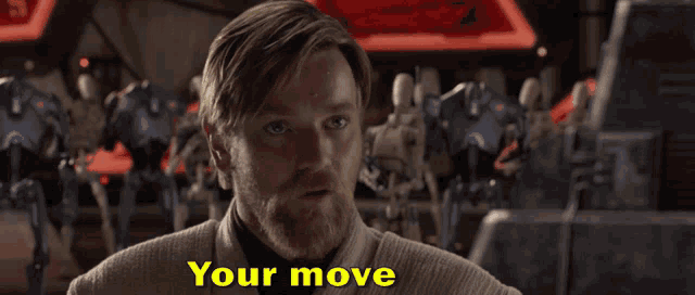 a man with a beard says your move