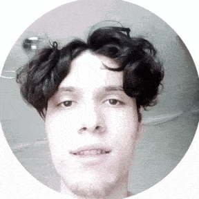 a man with curly hair and a beard is in a circle