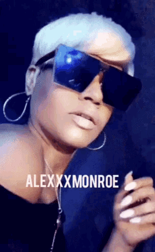 a woman wearing sunglasses with the name alexxxmonroe written on the bottom