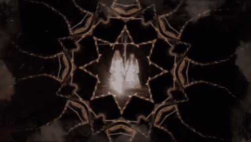 a kaleidoscope with a picture of two people in the middle