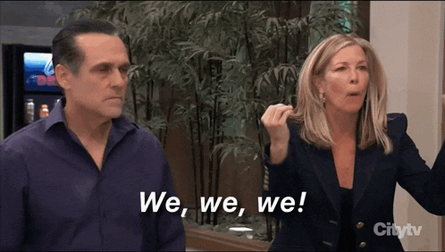 a man and a woman are standing next to each other and the woman says we we we on the screen