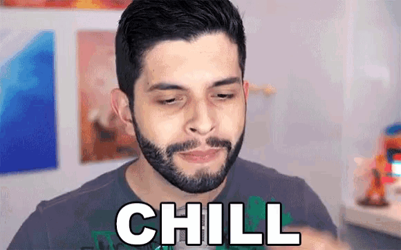 a man with a beard has the word chill written on his face .