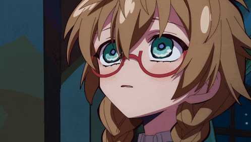a close up of a girl with glasses on