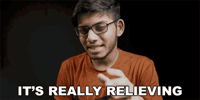 a young man wearing glasses is saying it 's really relieving