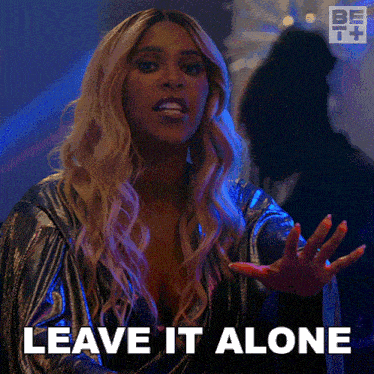 a woman says leave it alone with her hand out