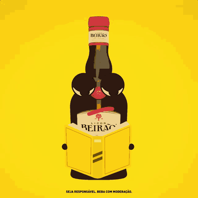 a bottle of licor beirao is holding a yellow book