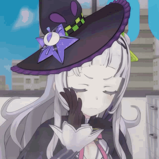 a girl wearing a purple hat with a star on it