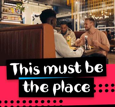 a sign that says " this must be the place "