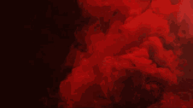 a red background with a few white lines and smoke
