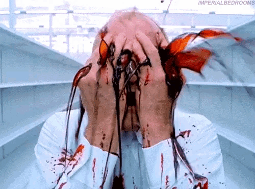 a man in a white shirt is covered in blood with the words imperial bedrooms written above him