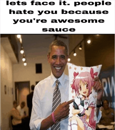 a man in a tie is holding a pillow with a girl on it ..