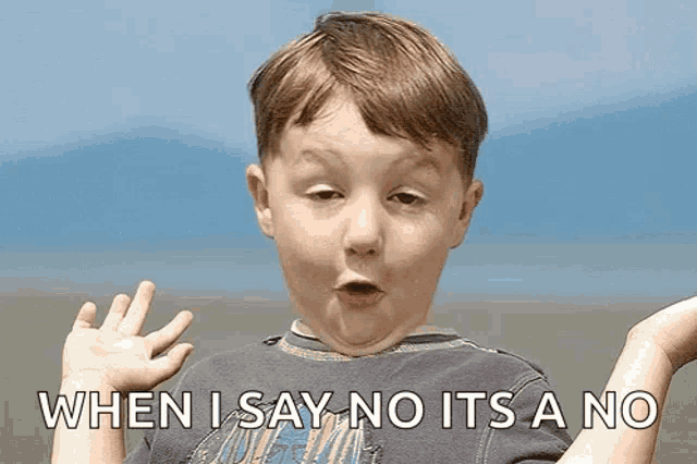a young boy is making a funny face with the words when i say no it 's a no below him