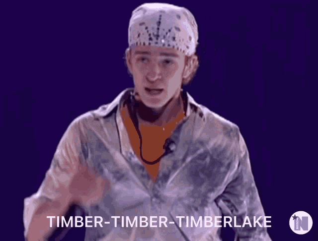 a man wearing a bandana and a shirt says timber timber timberlake