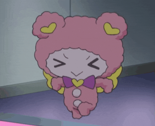 a pink cartoon character with a purple bow tie and a heart on his chest