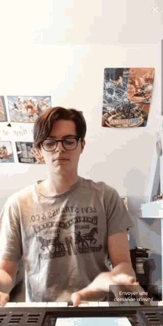 a man wearing a shirt that says ' levi 's ' on it