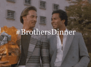 two men standing in front of a building with the words #brothersdinner written on the bottom